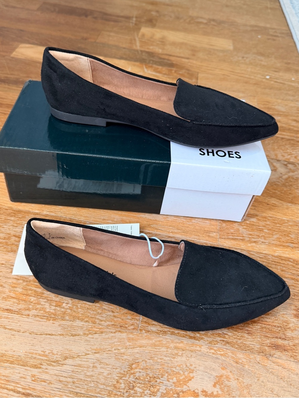 Classic Pointed-Toe Slip-On Flats in Black